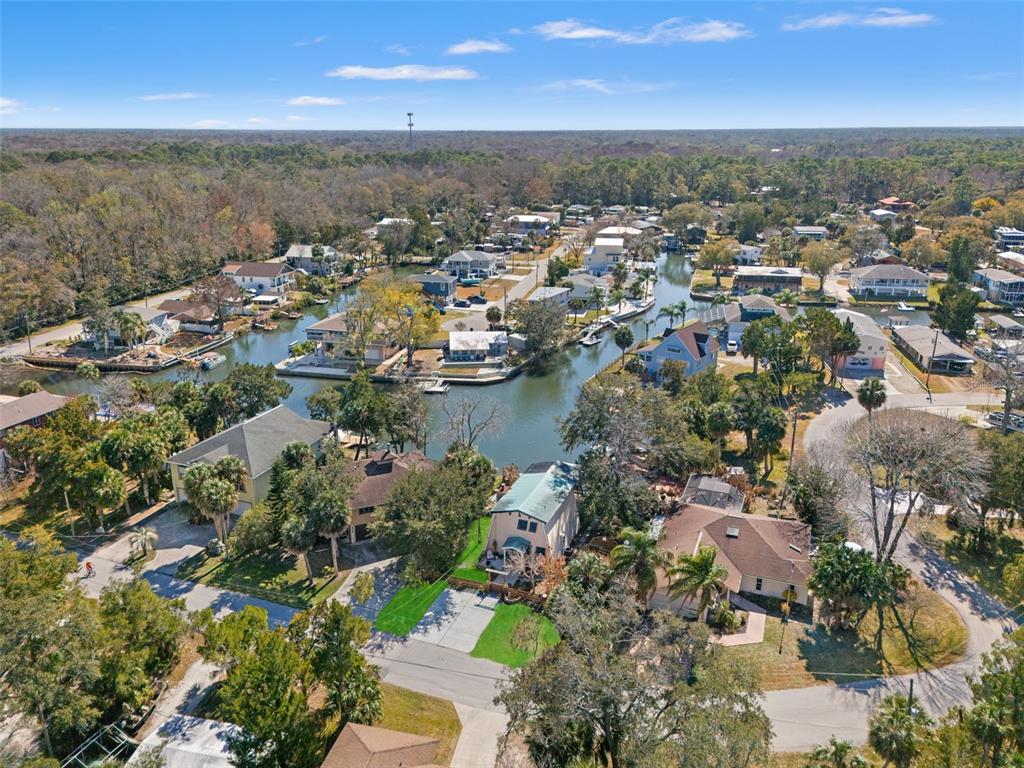 6271 Colony Circle Weeki Wachee, FL 34607 - Photo 55 of 60 an aerial view of ocean and residential houses with outdoor space