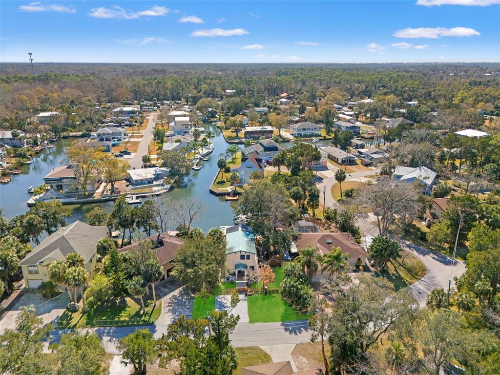 6271 Colony Circle Weeki Wachee, FL 34607 - Photo 56 of 60 an aerial view of residential houses with outdoor space