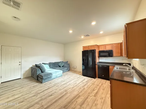 a bedroom with a bed and furniture