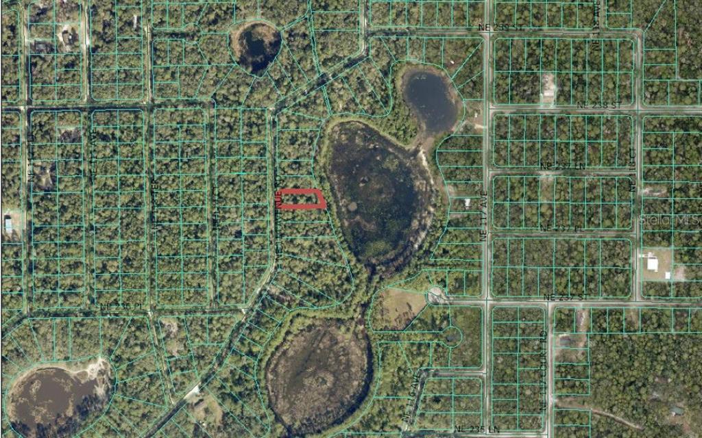 0 Northeast 114th Avenue Road Fort McCoy, FL 32134 - Photo 3 of 17 a bathroom with a shower and a sink