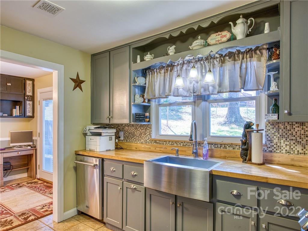 550 Lickstone Road Waynesville, NC 28786 - Photo 12 of 24 a kitchen with lots of counter top space