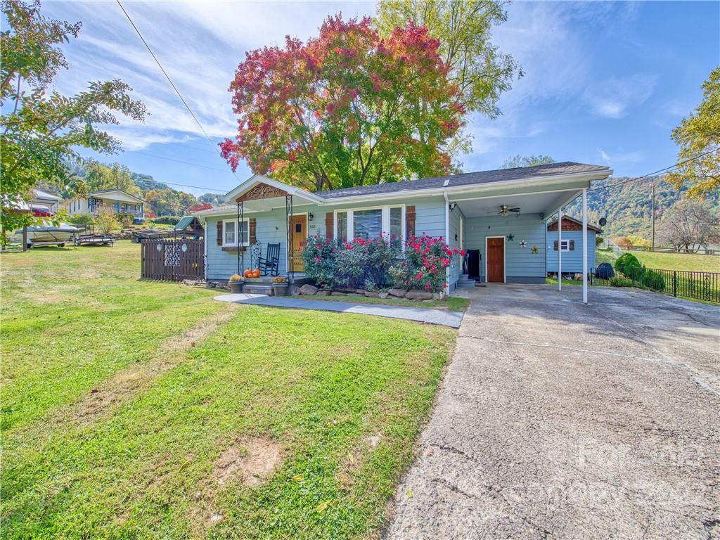 550 Lickstone Road Waynesville, NC 28786 - Photo 2 of 24 a front view of house with yard and green space