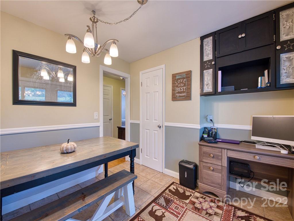 550 Lickstone Road Waynesville, NC 28786 - Photo 21 of 24 a workspace with furniture and window