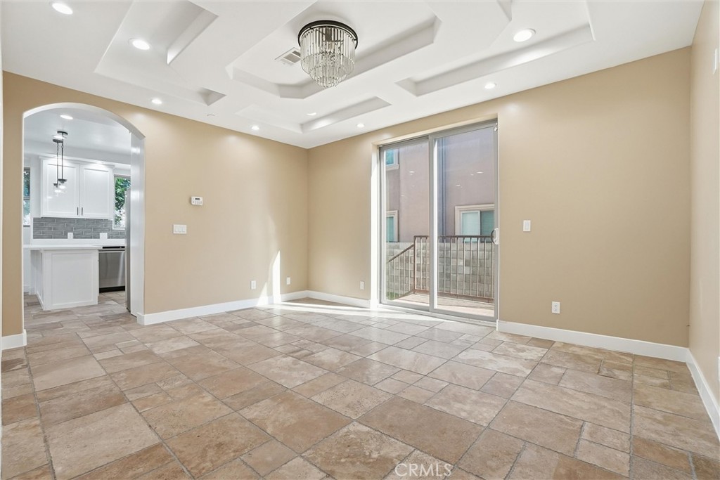 127 West 219th Place Carson, CA 90745 - Photo 13 of 69 Formal dining room featuring architectural inverted recessed tray design ceiling.