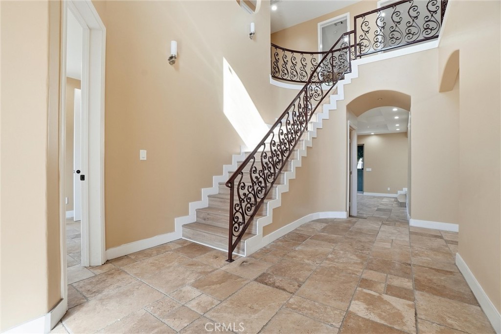 127 West 219th Place Carson, CA 90745 - Photo 3 of 69 Beautiful foyer with architectural metalwork railing.
