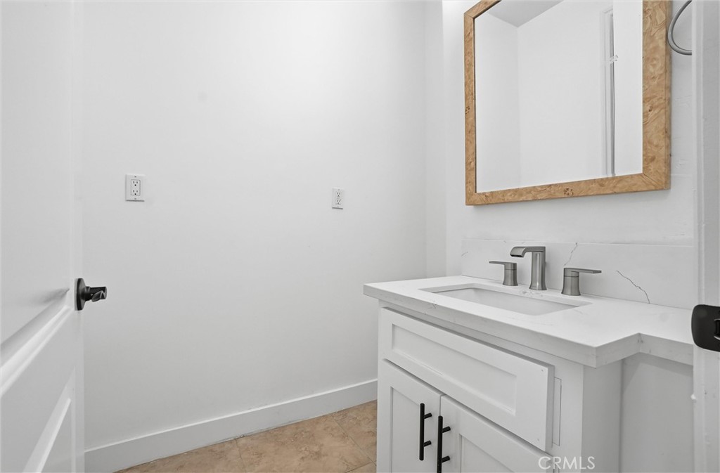 127 West 219th Place Carson, CA 90745 - Photo 32 of 69 Hallway bathroom vanity.