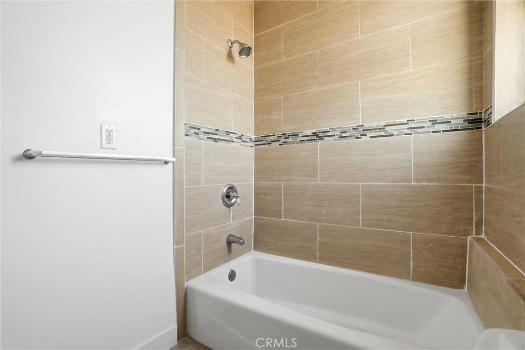 127 West 219th Place Carson, CA 90745 - Photo 33 of 69 Hallway bathroom with tub.