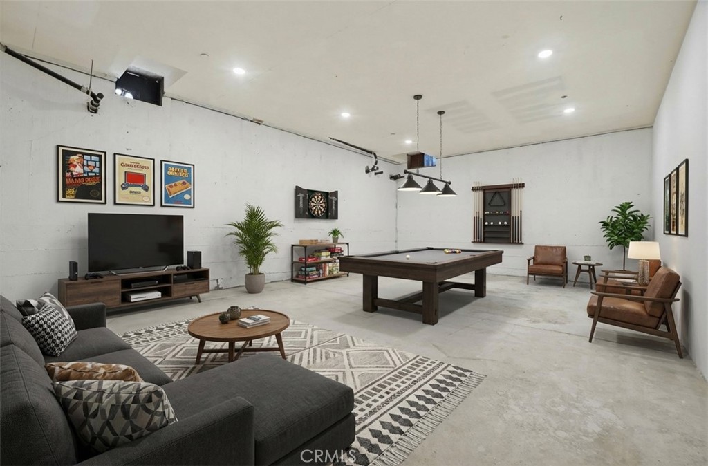 127 West 219th Place Carson, CA 90745 - Photo 44 of 69 Virtually staged basement room.