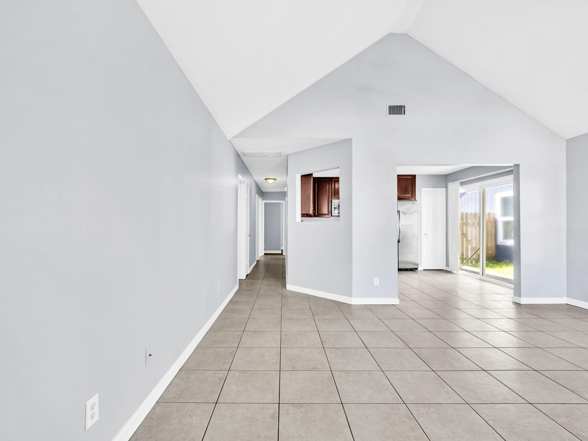 3024 Yorktown Circle Fort Walton Beach, FL 32547 - Photo 3 of 24 a view of a big room with closet and windows