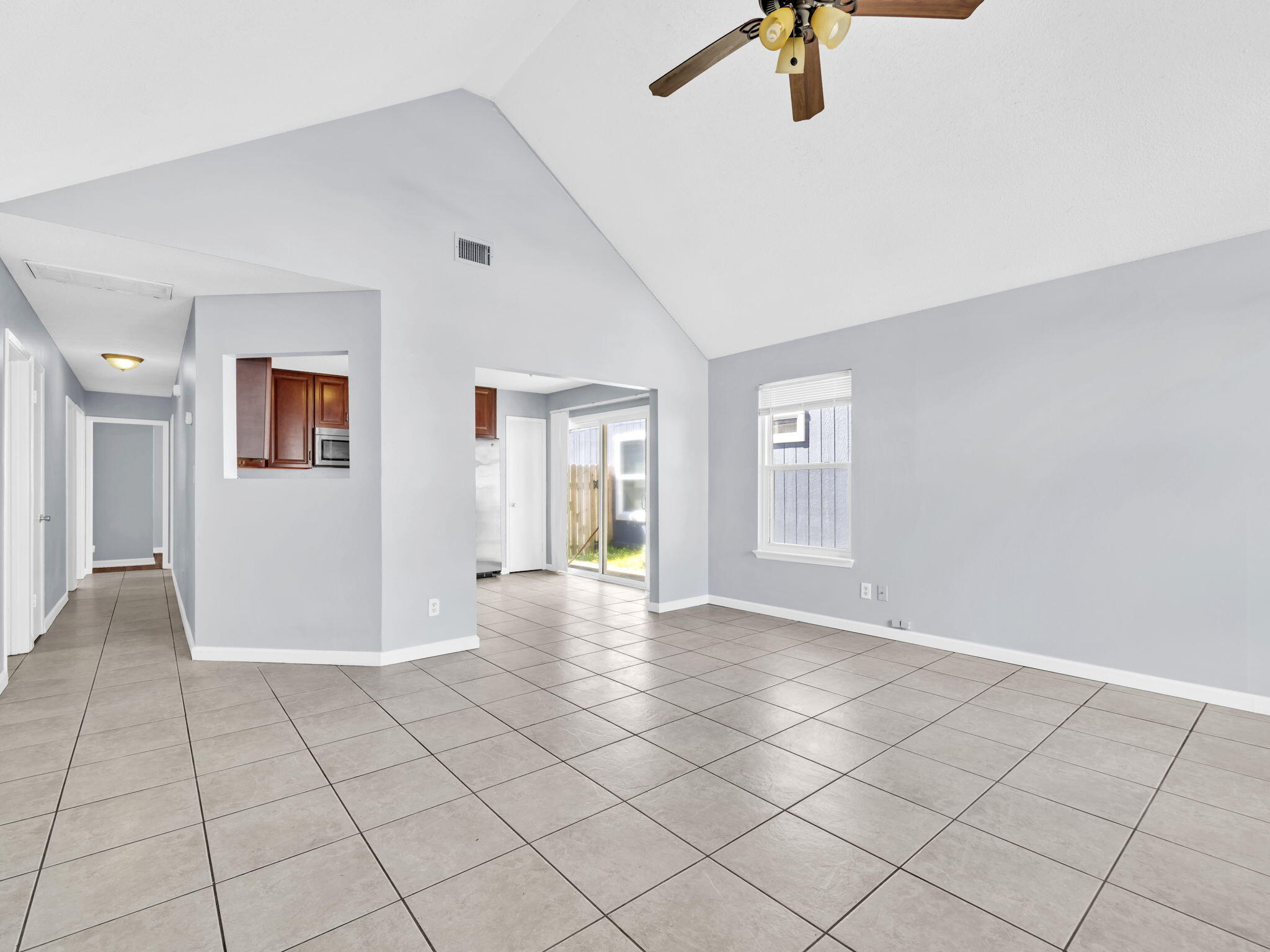 3024 Yorktown Circle Fort Walton Beach, FL 32547 - Photo 4 of 24 a view of an empty room and window