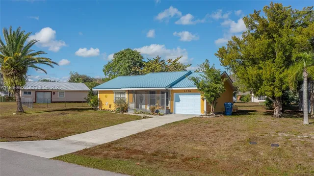 a view of a house with a patio