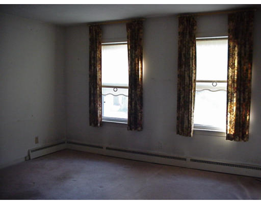224 Easthampton Road Holyoke, MA 01040 - Photo 8 of 9 a view of an empty room and window