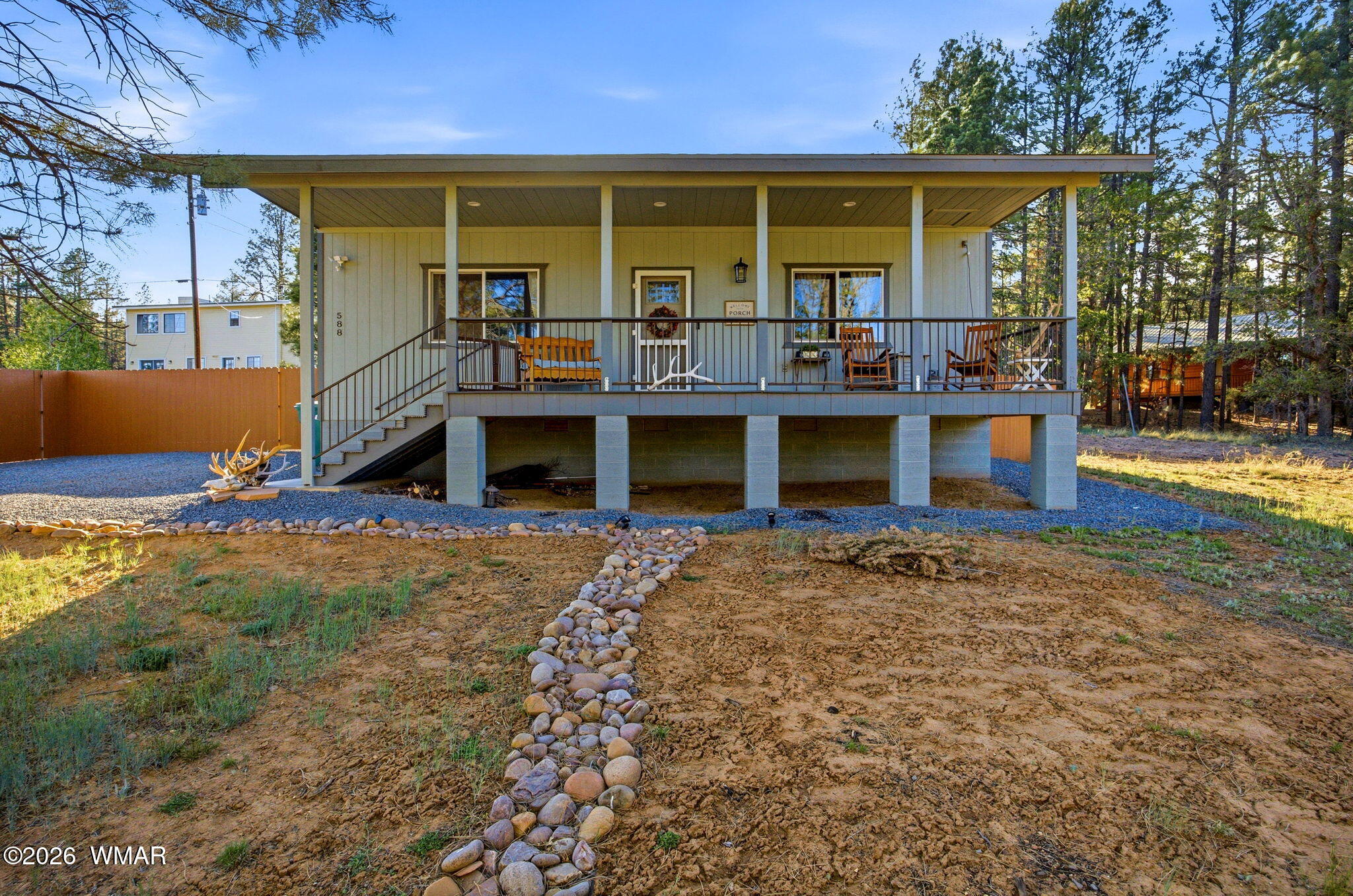 588 Rim Road Pinedale, AZ 85934 - Photo 6 of 30 front view of a house with a large window