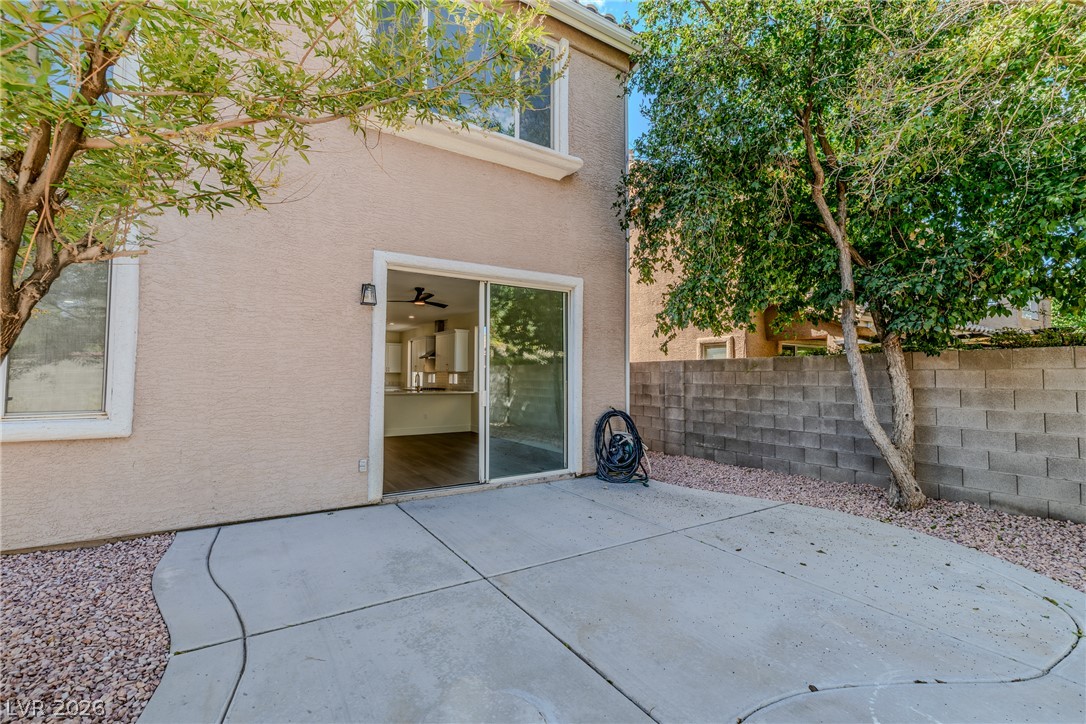 1832 Spring Summit Lane Las Vegas, NV 89134 - Photo 51 of 52 A spacious backyard patio provides direct access to the interior, perfect for outdoor entertaining.