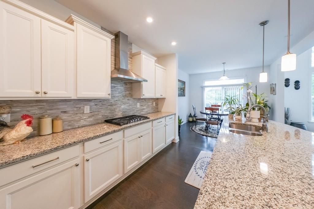 5116 Barton Pass Northwest Acworth, GA 30101 - Photo 13 of 42 a large white kitchen with lots of counter space