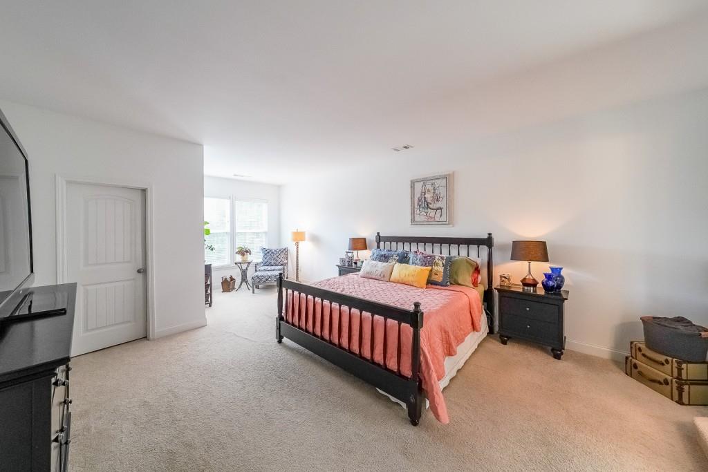 5116 Barton Pass Northwest Acworth, GA 30101 - Photo 14 of 42 a bed room with a bed and a chair