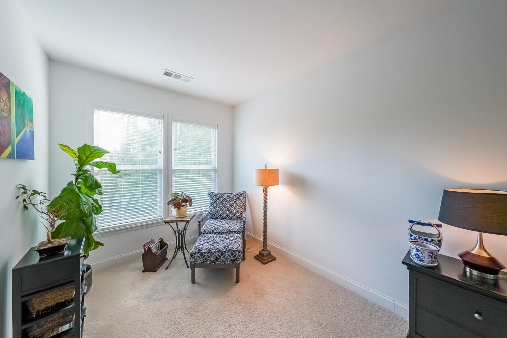 5116 Barton Pass Northwest Acworth, GA 30101 - Photo 15 of 42 a living room with furniture and a potted plant