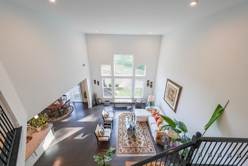 5116 Barton Pass Northwest Acworth, GA 30101 - Photo 21 of 42 a living room with furniture and floor to ceiling window