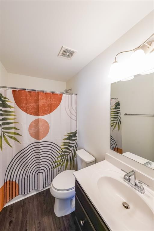 5116 Barton Pass Northwest Acworth, GA 30101 - Photo 23 of 42 a bathroom with a sink a toilet and mirror