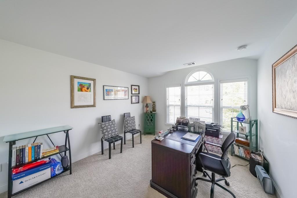 5116 Barton Pass Northwest Acworth, GA 30101 - Photo 26 of 42 a view of a livingroom with furniture and a window