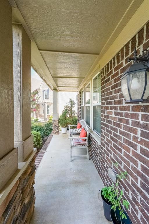 5116 Barton Pass Northwest Acworth, GA 30101 - Photo 3 of 42 a view of a patio with table and chairs and potted plants