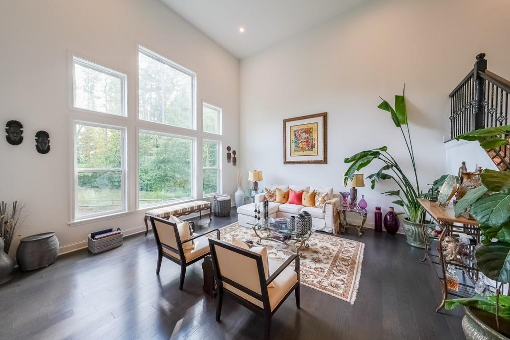 5116 Barton Pass Northwest Acworth, GA 30101 - Photo 7 of 42 a living room with furniture and a potted plant
