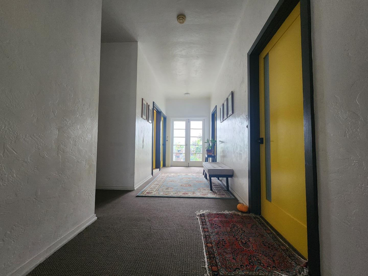 1240 4th Street San Rafael, CA 94901 - Photo 5 of 12 a living room with a couch and a table
