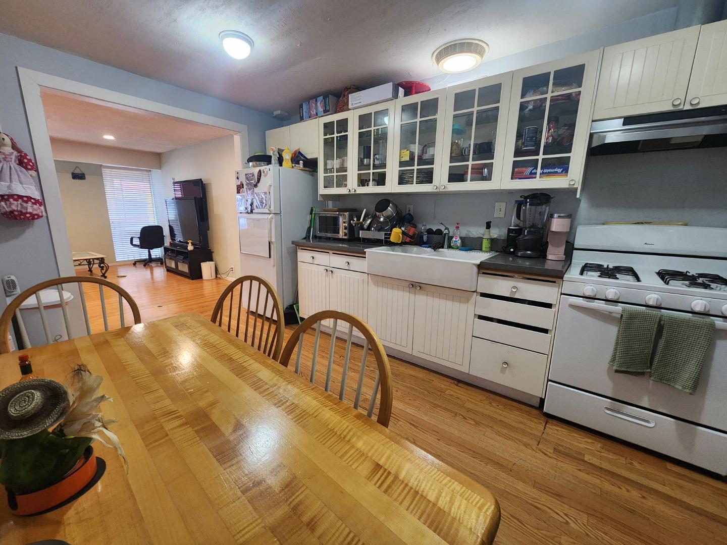 1240 4th Street San Rafael, CA 94901 - Photo 7 of 12 a kitchen with furniture and a stove