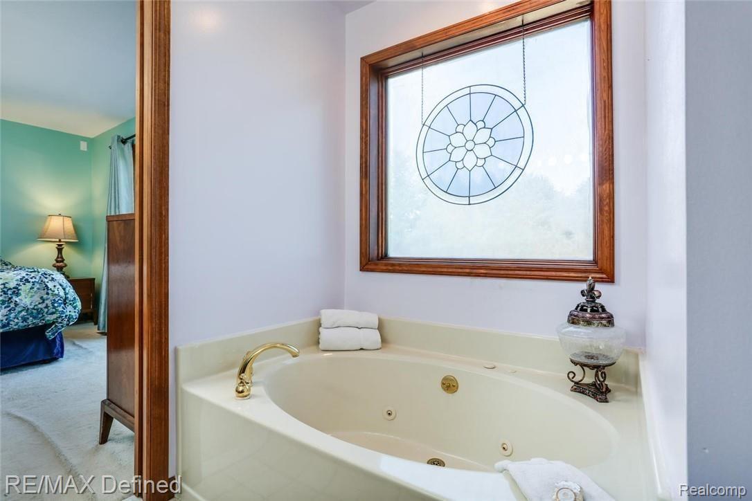 3778 Barnes Lake Road Columbiaville, MI 48421 - Photo 28 of 42 Jetted Tub
