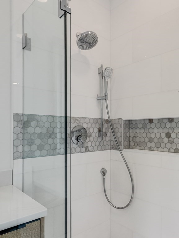 27 Nightingale Path Newton, MA 02459 - Photo 11 of 13 a bathroom with a shower