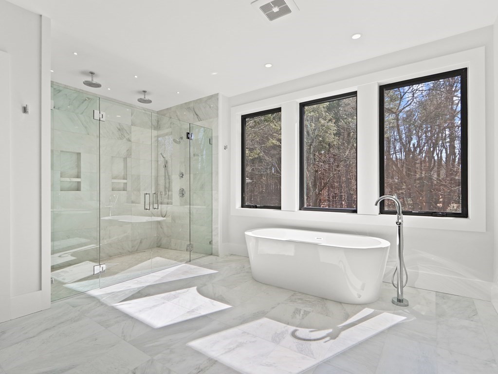 27 Nightingale Path Newton, MA 02459 - Photo 13 of 13 a spacious bathroom with toilet shower and a bathtub