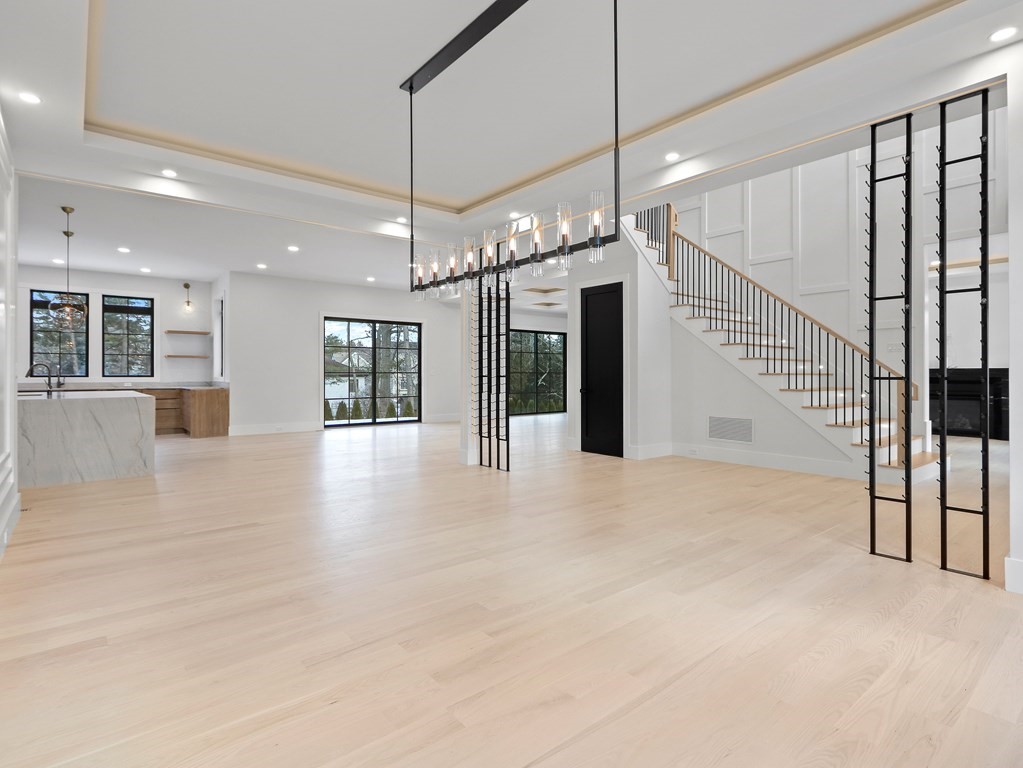 27 Nightingale Path Newton, MA 02459 - Photo 3 of 13 a view of an entryway with a chandelier