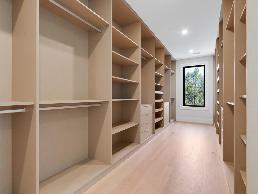 27 Nightingale Path Newton, MA 02459 - Photo 9 of 13 a view of an empty room with a window