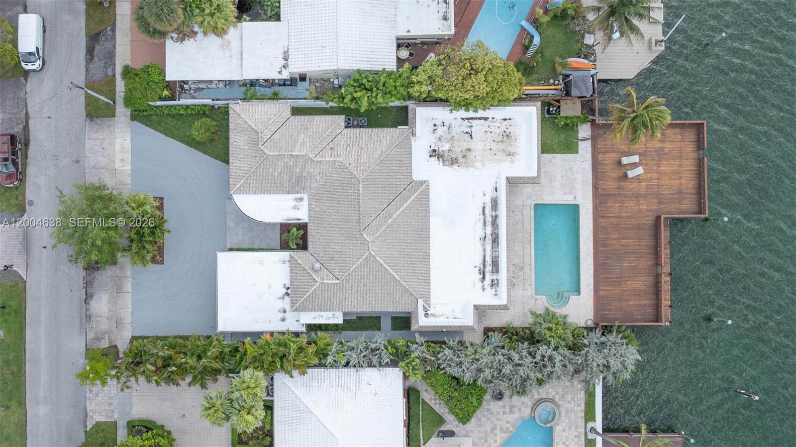 1690 Daytonia Road Miami Beach, FL 33141 - Photo 11 of 88 aerial view of a house with a yard and garden