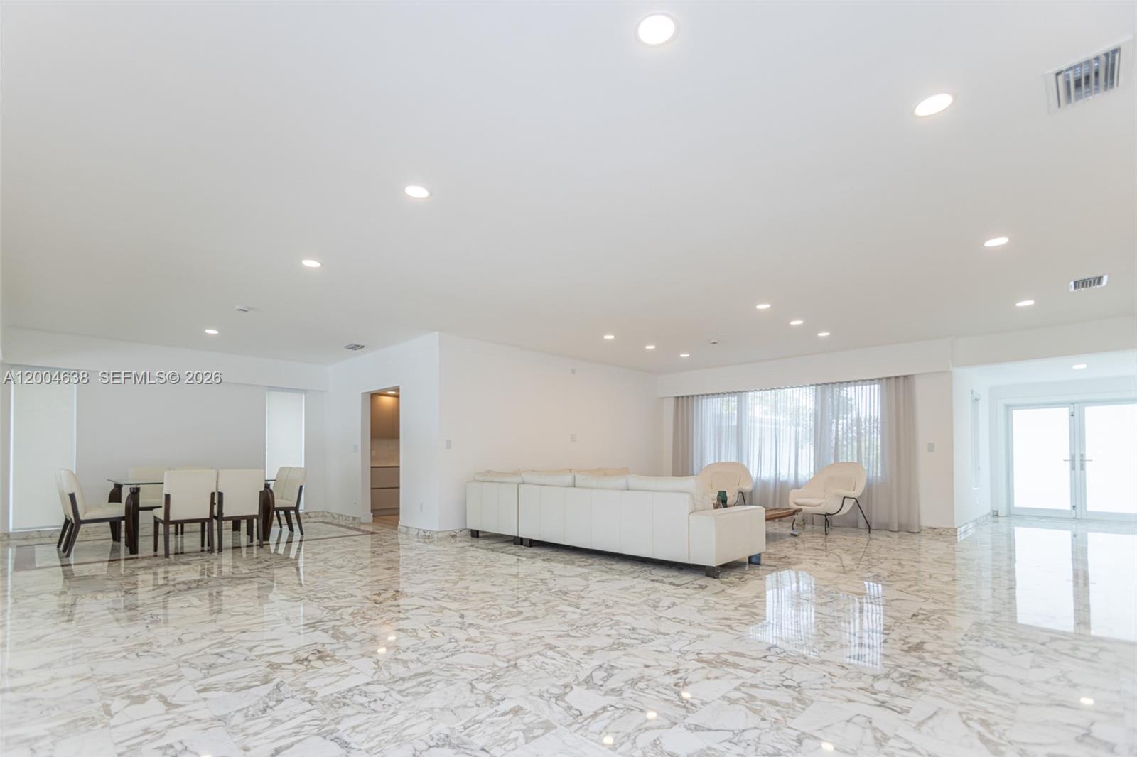 1690 Daytonia Road Miami Beach, FL 33141 - Photo 51 of 88 a view of kitchen with furniture and a view of living room