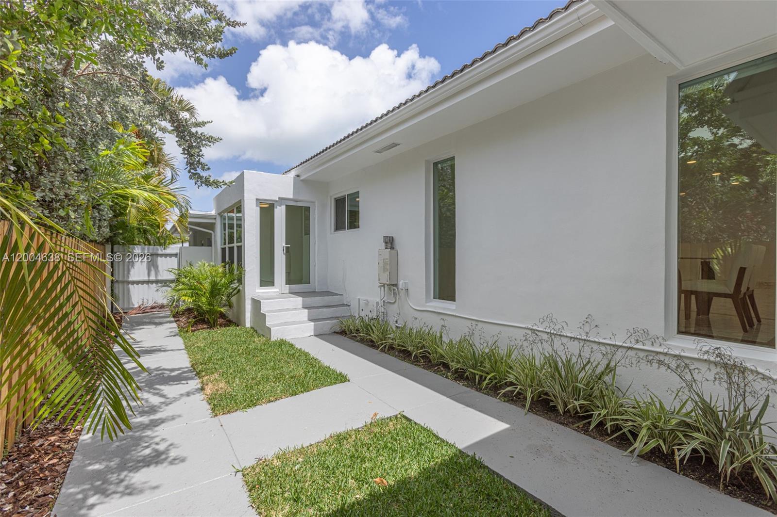 1690 Daytonia Road Miami Beach, FL 33141 - Photo 84 of 88 a view of a house with a small yard