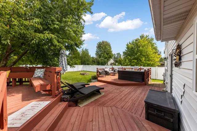 a view of a terrace with furniture