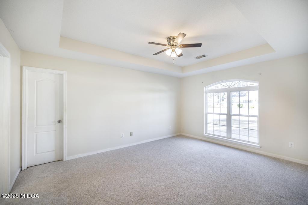 204 Chimney Rock Road Perry, GA 31069 - Photo 15 of 28 a view of an empty room with a window