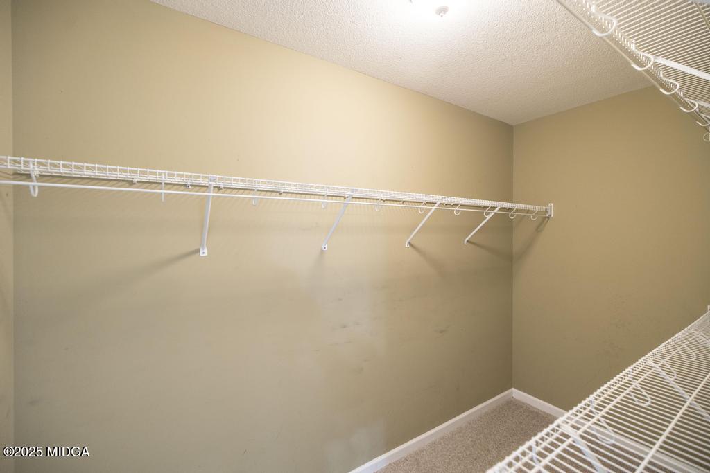 204 Chimney Rock Road Perry, GA 31069 - Photo 18 of 28 a view of a room with racks on the wall