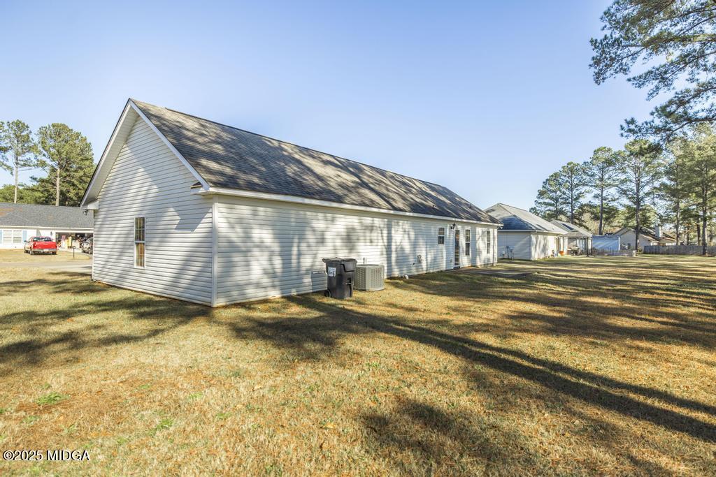 204 Chimney Rock Road Perry, GA 31069 - Photo 25 of 28 a view of pool in front of house