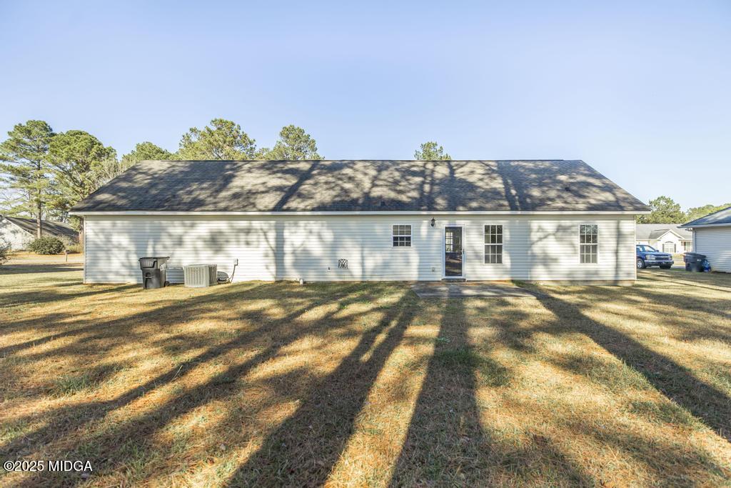 204 Chimney Rock Road Perry, GA 31069 - Photo 26 of 28 a front view of a house with a yard
