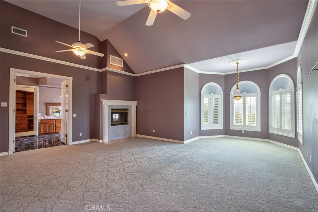 46856 El Prado Road Temecula, CA 92590 - Photo 30 of 75 a view of a livingroom with a ceiling fan window and a ceiling fan