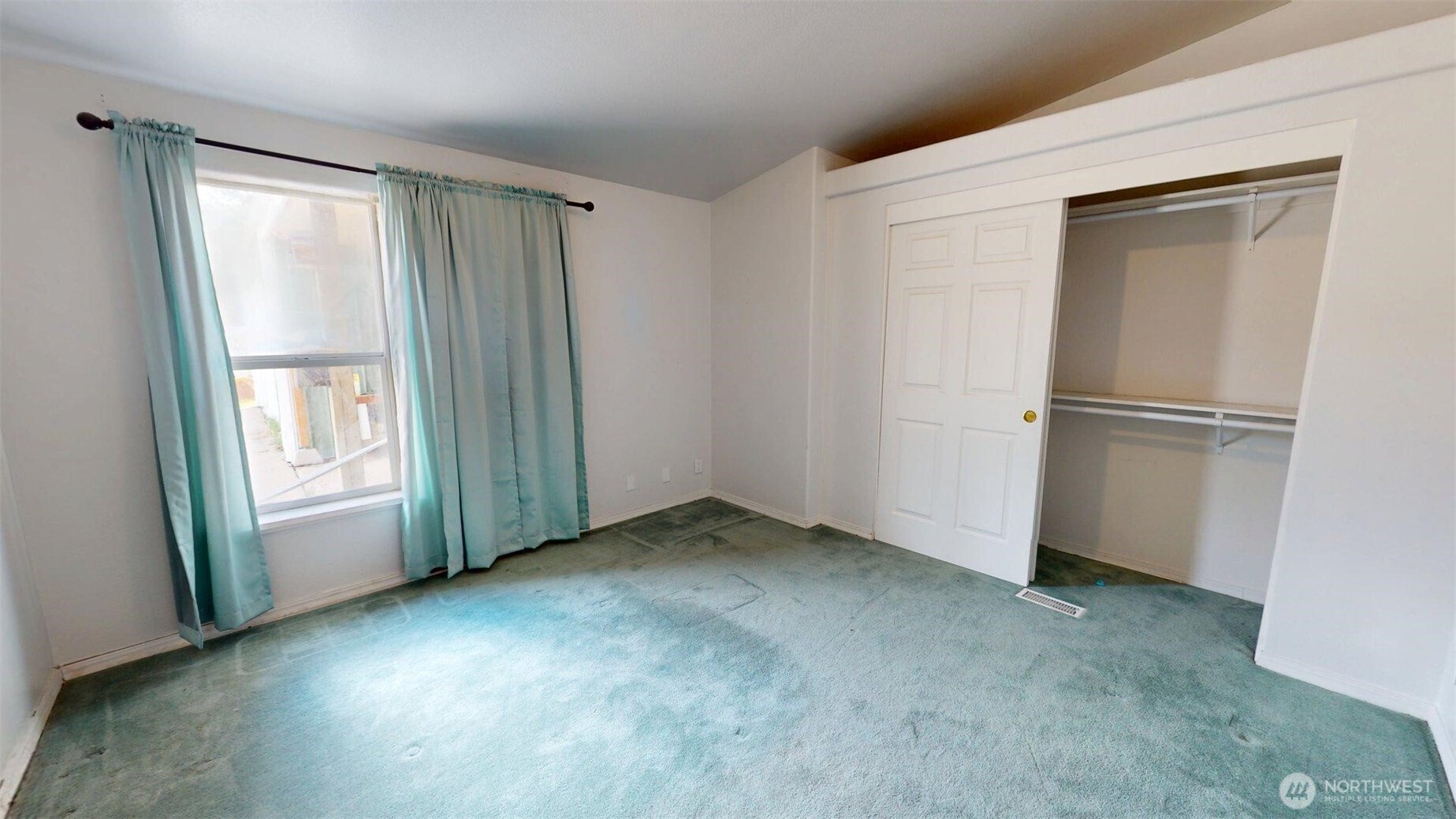 142 Fletcher Road Oroville, WA 98844 - Photo 12 of 26 a view of empty room with window