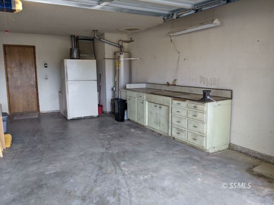 348 South Locust Street Ridgecrest, CA 93555 - Photo 19 of 21 a view of a storage & utility room