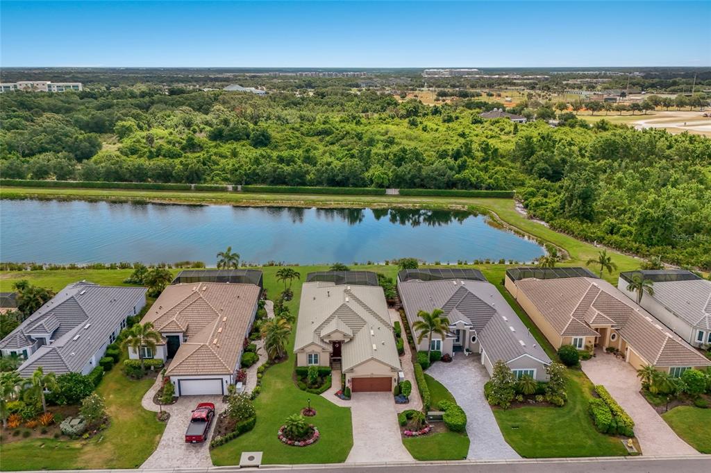 5011 Tobermory Way Bradenton, FL 34211 - Photo 33 of 77 an aerial view of a house with a lake view