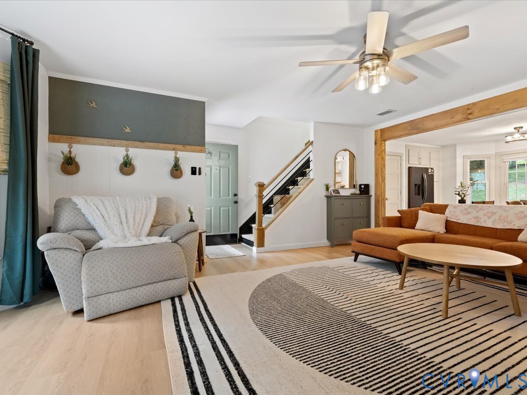 6806 Full Rack Circle Midlothian, VA 23112 - Photo 3 of 29 a living room with furniture and a chandelier