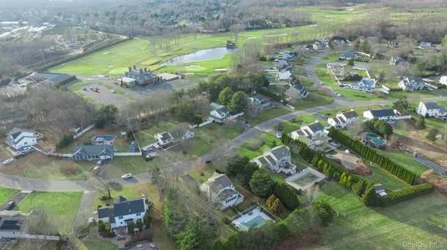 a view of a lake with a yard