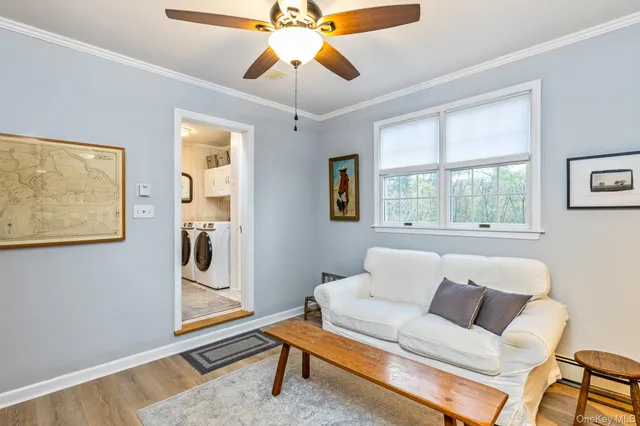 a living room with furniture and a window
