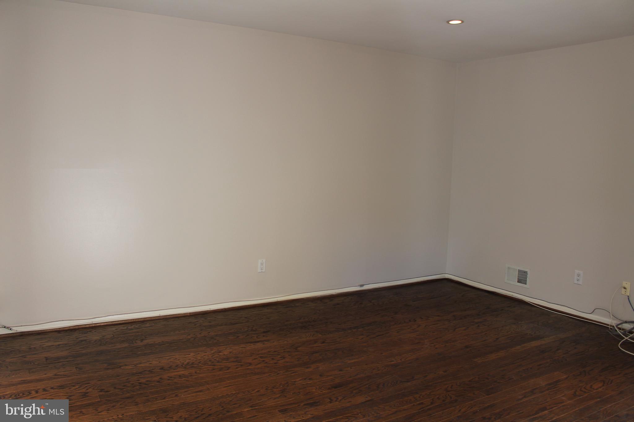 175 Leedom Way Newtown, PA 18940 - Photo 17 of 36 a view of an empty room with wooden floor