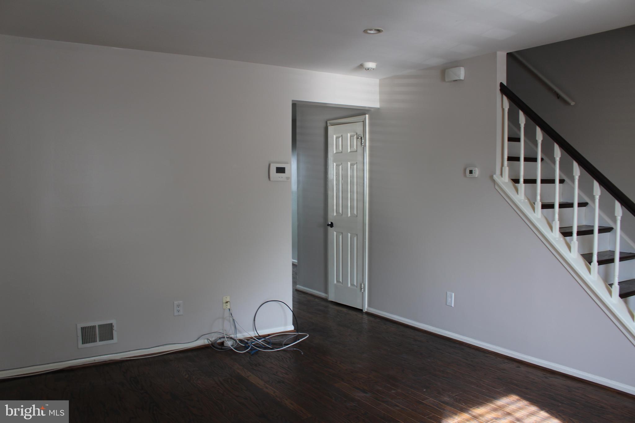 175 Leedom Way Newtown, PA 18940 - Photo 18 of 36 a view of an empty room with wooden floor